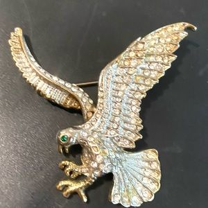 Crystal eagle brooch with  emerald eye gold  tone estimate 3inches